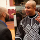 The Rev. Delman Coates and a parishioner at Mount Ennon Baptist Church(The Washington Post/Getty Images)